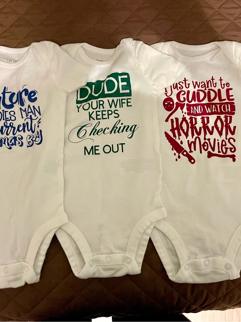 Carter's White Baby One-Piece Trio with Blue, Green, and Red Prints